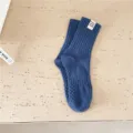 Men's blue ribbed mid-tube sports socks with anti-slip sole and stylish cloth label detail. - One Size / Blue