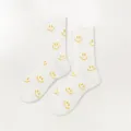 Chaussettes mi-mollet blanches avec imprime smiley jaune, chaussettes decontractees en coton. - Taille unique / Chaussettes blanches à motif smiley jaune partout