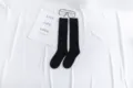 Schwarze lange Socken für Damen, einfarbige Baumwoll Wadensocken für den täglichen Freizeitlook. - Einheitsgröße / Schwarz