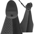 Detail view of microfiber golf towel with magnetic attachment and waffle texture - Black