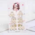 Set of six elegant mini faux pearl hair claw clips on a cute cartoon display card - Hollow Rhombus Style (a24) / 6 Pieces/Pack / Pearl White