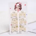Detailed view of six small elegant faux pearl hair claw clips on a cute display card - Hollow Rectangular Style (a9) / 6 Pieces/Pack