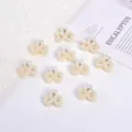 Set of mini cream pearl hair claw clips for elegant summer hairstyles - Hollow Symmetrical Heart Style / 10 Pieces/Pack