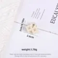 Elegant mini white pearl hair claw clip for girls, compact hair accessory for styling - Hollow Symmetrical Rhombus Style / Single Piece