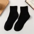 Classic black mid-calf socks for women and men, comfortable cotton knit basic daily wear. - One Size / Ankle Socks / Black