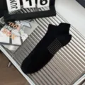 Men breathable mesh athletic low cut socks with pull tab, solid black non slip sports socks. - One Size / Black