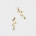 Detailed close-up view of gold branch connector charms with leaves for DIY jewelry making. - Short Branch Style / Gold