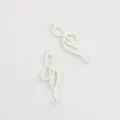 White enamel bow double loop connector pendant for DIY jewelry making detail view. - White