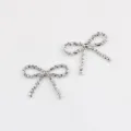 Silberne Legierung Schleife Anhänger Charms für DIY handgemachte Armbänder Halsketten Schmuck - Weiß K/Silber