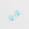 Close-up of cute light blue alloy balloon dog charms for DIY jewelry making parts. - Blue
