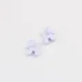 Close-up view of light purple alloy mini balloon dog charms, perfect for DIY crafts. - Purple