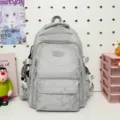 Lässiger Sternen-Rucksack mit großer Kapazität und vielen Fächern für Alltag und Reise - Mit Anhänger / Hellgrau
