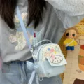 Cute light blue striped mini backpack detail with bow pendant and puppy motif for daily use. - Blue with Charm / Blue