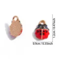 Pendentif charm coccinelle en alliage émaillé rouge et noir pour accessoire de bijou. - Style Coccinelle à Sept Points (A8-412) / 12x9mm