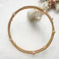 Multi-layer golden wire bracelet with pink freshwater pearls elegant wrist jewelry for women. - Pink Gold