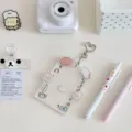Cute transparent acrylic photocard holder with adorable animal charms and keyring. - Dog