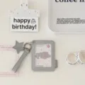 Glitter star PU photocard holder detail showing sparkling texture and metal ring pendant. - Silver