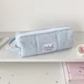 Close-up detail of the cute light blue star-patterned canvas pencil case with zipper. - Blue