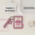 Pink glitter PU photocard holder with star pendant and wrist strap for ID or idol cards. - Pink