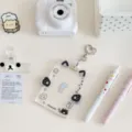 Clear acrylic cat photocard holder cute ins transparent card sleeve with heart keychain detail. - Cat