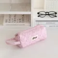 Cute pink quilted pencil case with heart dot pattern and handy strap for school and daily use. - Pink