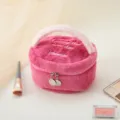 Pink plush cosmetic bag closeup, soft fluffy texture, round storage pouch with zipper. - Rose Red