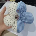 Close-up detail of the cute plaid and polka dot fabric flower hair scrunchie, handmade style. - Blue Plaid Polka Dot