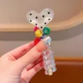 Transparent heart polka dot hair tie with colorful beads and spiral phone cord design for daily wear. - Beige Heart Spiral Hair Tie