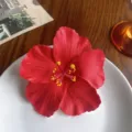 Red artificial hibiscus flower hair clip, Hawaiian floral hair accessory for women. - Red