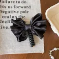Molletta per capelli con fiocco in raso nero stile coreano coda di cavallo elastica - Nero