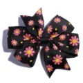 Detail view of the pink daisy floral print on a black ribbed ribbon hair bow - No Accessories on Back / Black