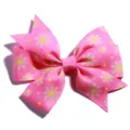 Detailed view of a pink grosgrain hair bow featuring yellow daisy floral prints - No Accessories on Back / Pink