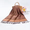 Close-up of brown pashmina scarf featuring intricate paisley jacquard and tassel details - Dark Brown (TH01)