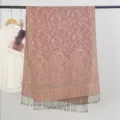 Detailed view of the paisley jacquard pattern and fringes of this vintage rose scarf - Paisley Jacquard Style with Tassels / 70x200cm / Pink