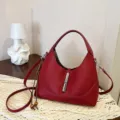 Red leather hobo shoulder bag with metal lock closure and stylish top handle for women. - Red with Pendant