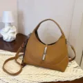 Elegant brown leather hobo bag with metal lock closure, versatile shoulder and crossbody bag. - Khaki with Pendant