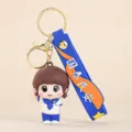 Mignon porte-clés poupée personnage de dessin animé, pendentif de sac à dos design uniforme bleu. - Poupée Féminine / Bleu