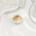 Macro view showing the elegant gold stripes on a pearlized shell hair claw clip - Shell Decoration / Mini Size (Approx 2.5cm) / Pearl White