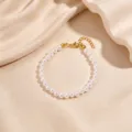 Pearl bracelet detail close-up view showing the elegant gold-plated clasp and smooth finish. - Pearl Bracelet