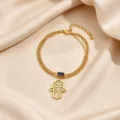 Exquisite gold stainless steel double layer bracelet with blue stone hamsa hand detail. - 9 Evil Eyes Style