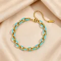 Edelstahl Gliederarmband in Gold mit blauer Emaillierung und praktischem Verlängerungskettchen. - Himmelblaues Emaille-Armband