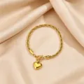 Gold-plated stainless steel rope chain bracelet with puffy heart pendant and OT toggle clasp. - Twist Chain Heart (6)