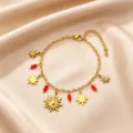 Gold-plated stainless steel charm bracelet featuring sun, star and red bead pendants. - Sun Pendant Style / Gold