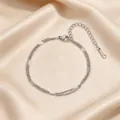 Stainless steel double layer bracelet for women, minimalist fashion design, elegant jewelry gift. - Embossed Double Layer Bracelet / Silver