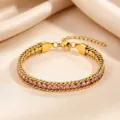 Gold-tone titanium steel bracelet for women, sparkling pink cubic zirconia charm link. - Pink Rhinestone Claw Chain Bracelet / Gold