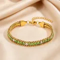 Exquisite titanium steel bracelet featuring sparkling green and clear cubic zirconia stones. - Light Green and White Rhinestone Claw Chain / Gold
