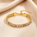 Titanium steel bracelet for women, elegant multi-color zircon rhinestone jewelry piece. - White and Pink Rhinestone Claw Chain Bracelet / Gold