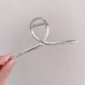 Silver metallic hair claw clip for women, sleek geometric metal hair catch styling accessory. - Cross Geometric (Approx 14cm) / Silver Glossy