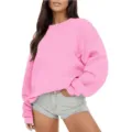 Détail sweat rose, texture polaire douce, coupe ample et décontractée pour le quotidien. - Sweatshirt à col rond rose