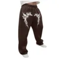 Pantalón de chándal holgado estampado gótico Y2K detalle tela marrón oscuro estilo urbano. - Café